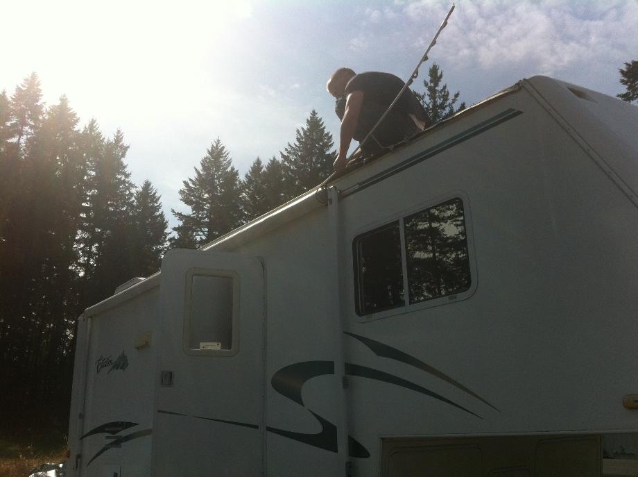 ROOFER ON TRAILER MILL BAY, B.C.