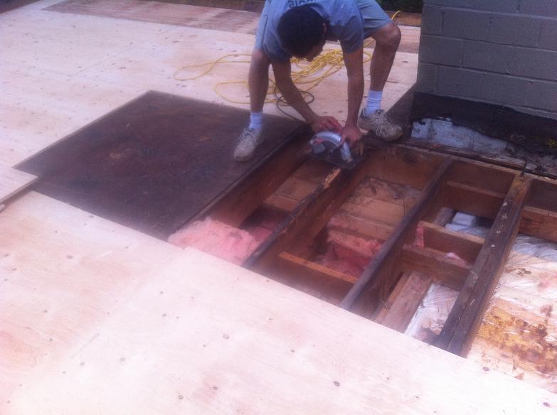 Installing new ply sheet on flat roof 